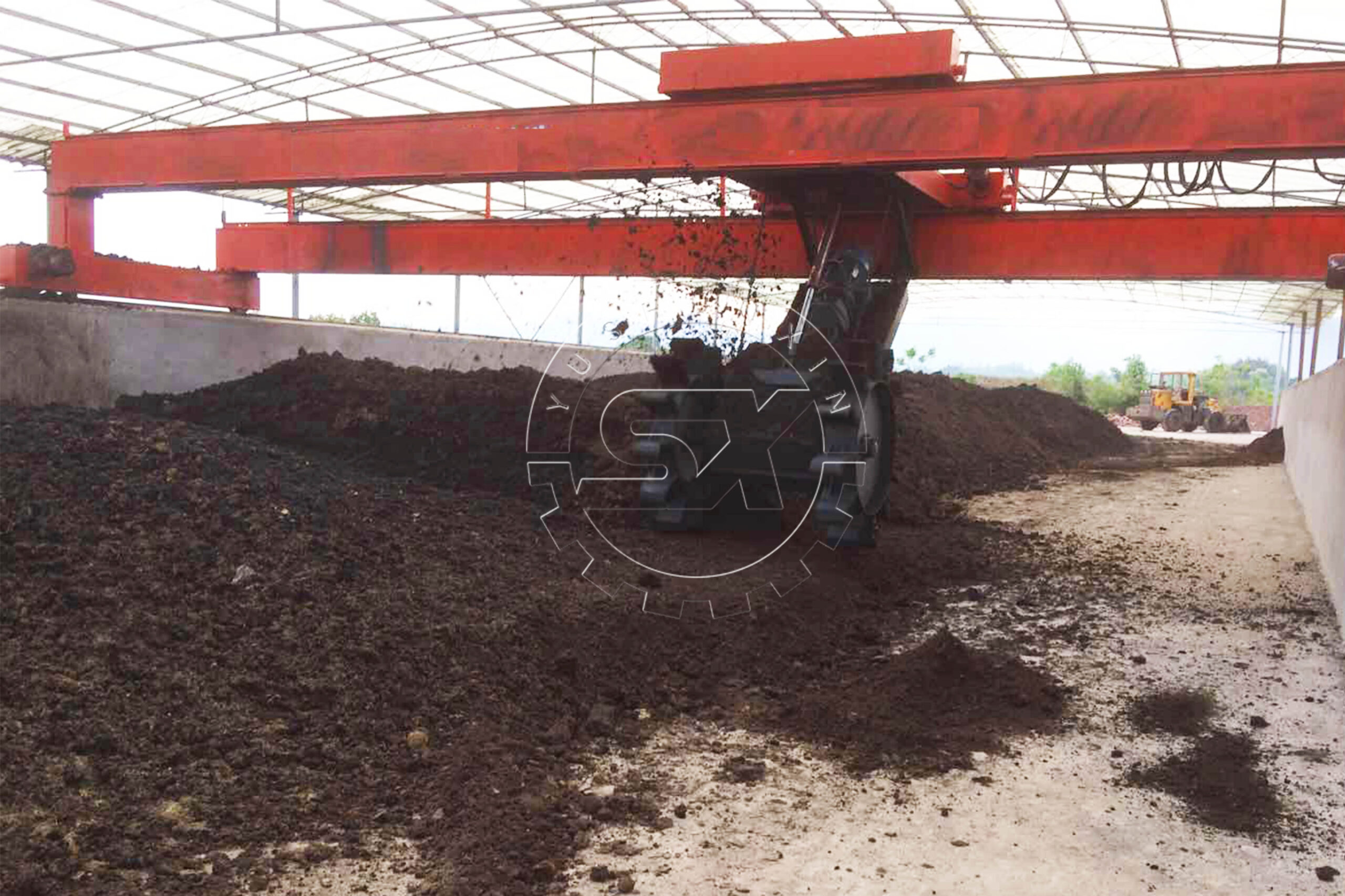 Wheel Type Compost Turner in a Large-scale Composting Factory