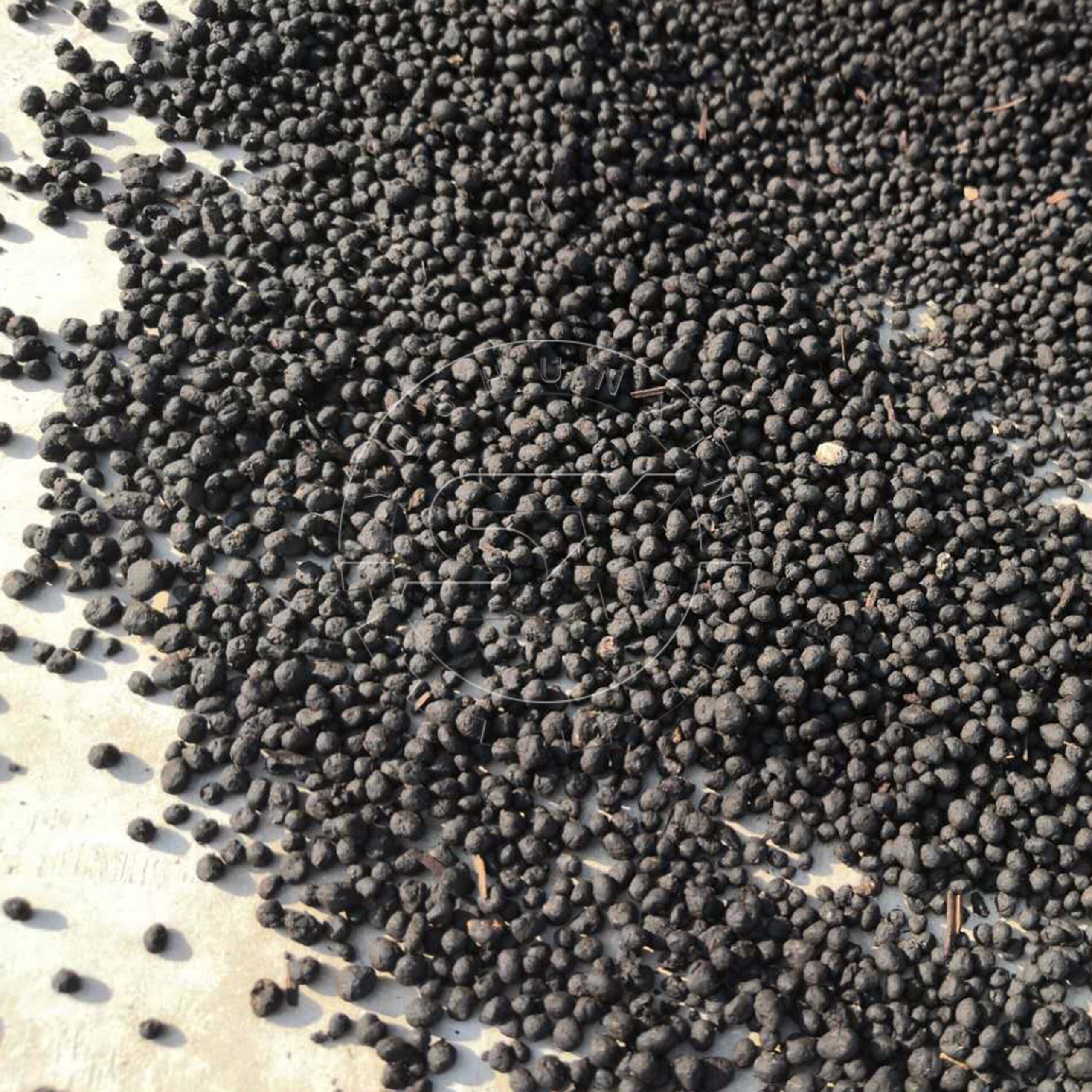 The fertilizer pellets produced by rotary drum churning granulator